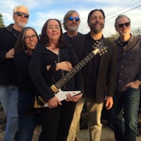 a group of people posing for a picture